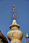 Bagan Myanmar. Next to the Gubyaukgyi stands the gilded Myazedi or 'Emerald Stupa'. 